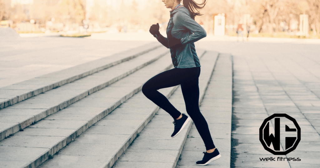 woman climbing stairs